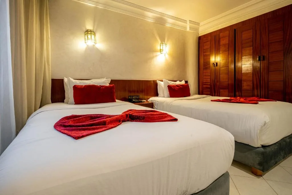 Chambre Lits Jumeaux — Hotel Casablanca